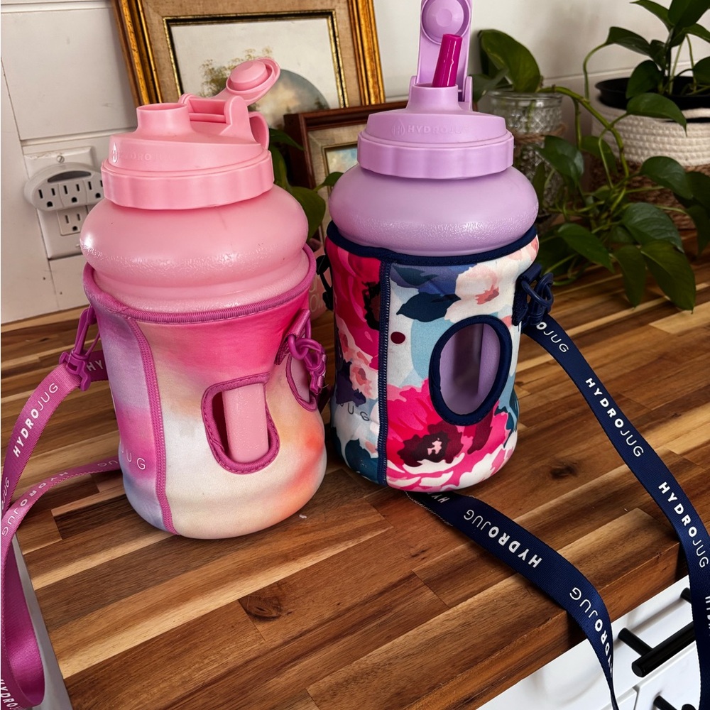 HydroJug Pink and Lavender Water Bottles with Floral Sleeves